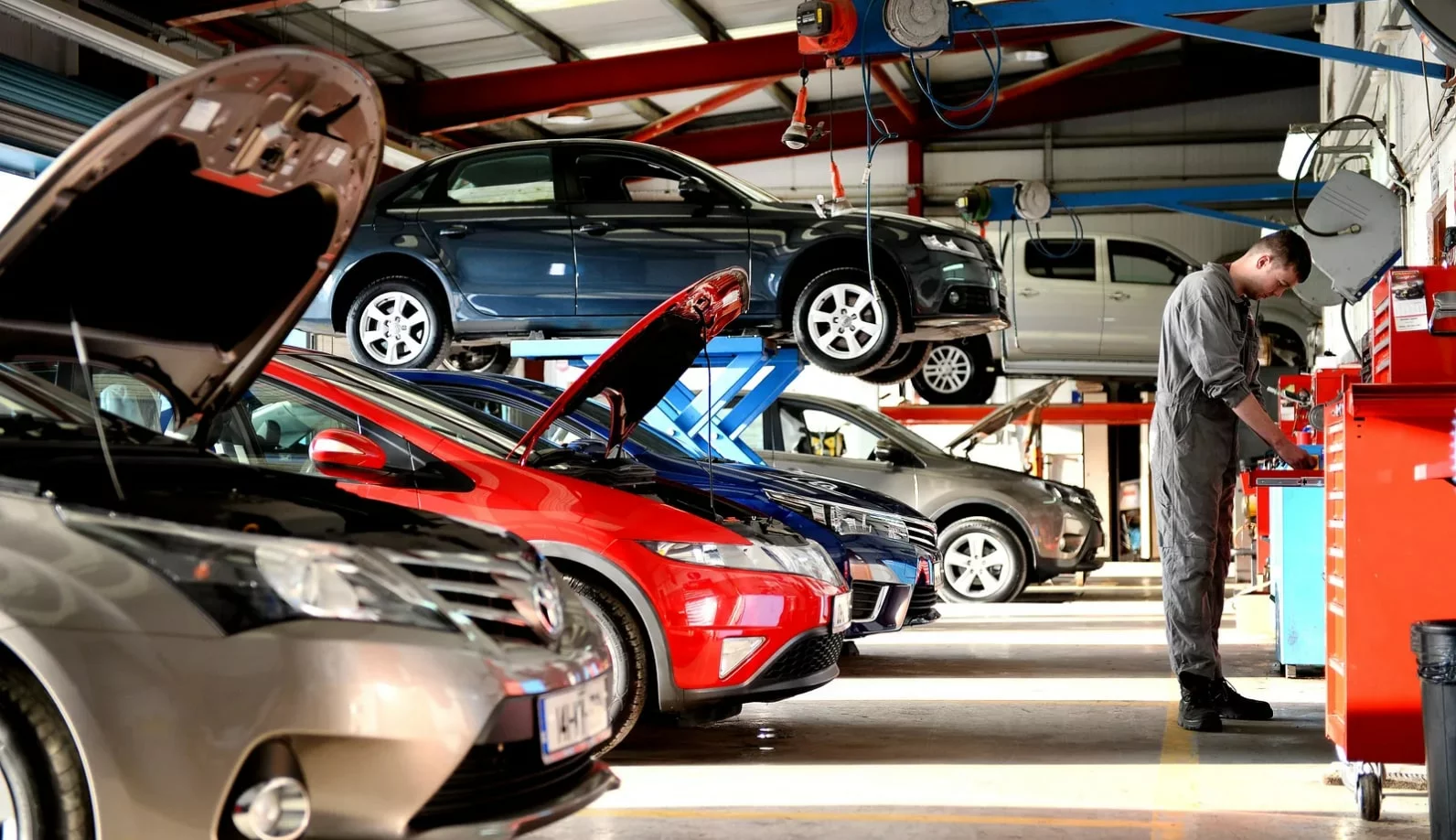 Cars inside workshop